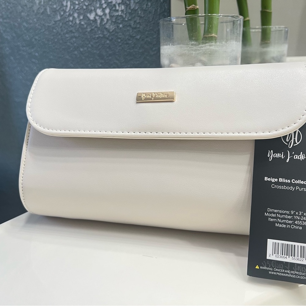 Cream Crossbody Bag with Flap Closure and Minimalist Design